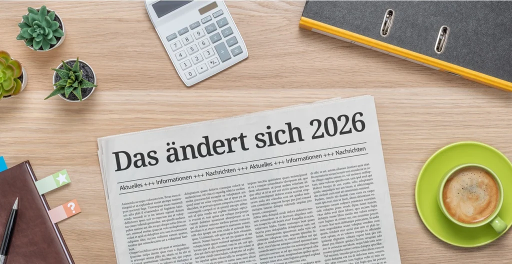 Eine Zeitung mit der Aufschrift was sich 2026 ändert liegt auf einem Tisch. Es geht um Änderungen des IPReGs.